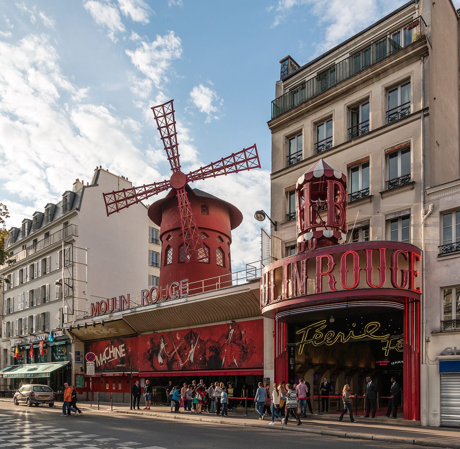 Moulin Rouge and its red windmill on boulevard de Clichy