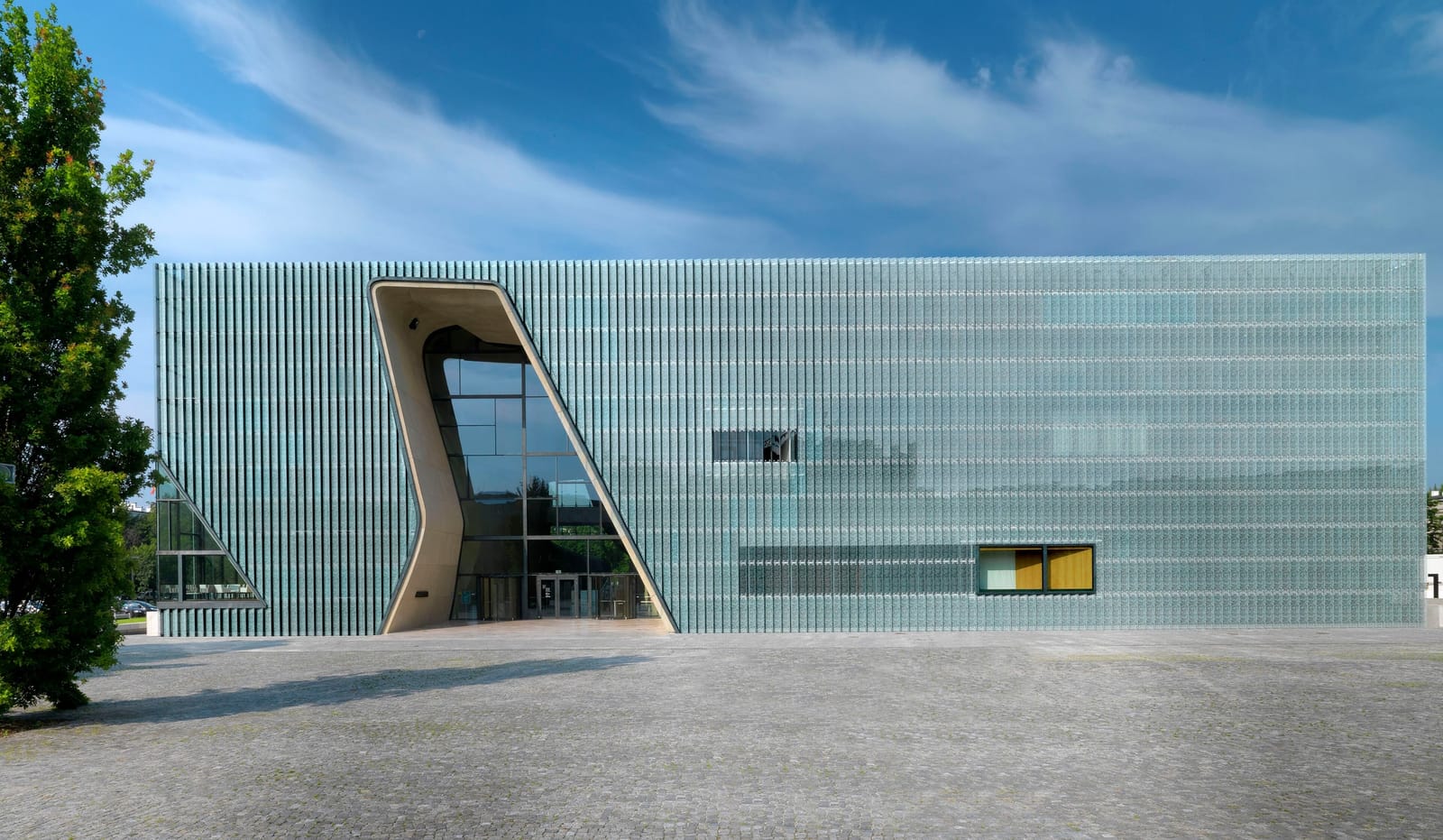 The glass facade and entrance of the POLIN Museum of the History of Polish Jews in Warsaw