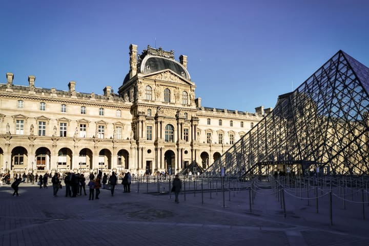 Louvre Museum and glass pyramid in Paris