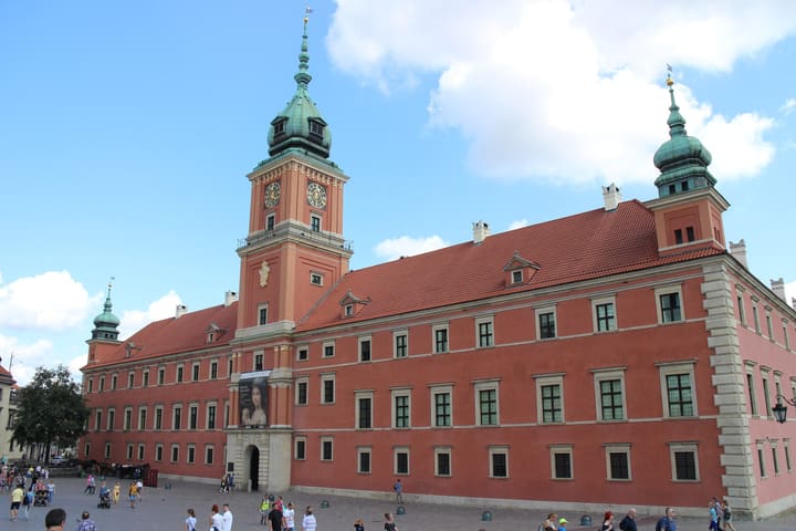 The Royal Castle in Warsaw and its clock tower on Castle Square