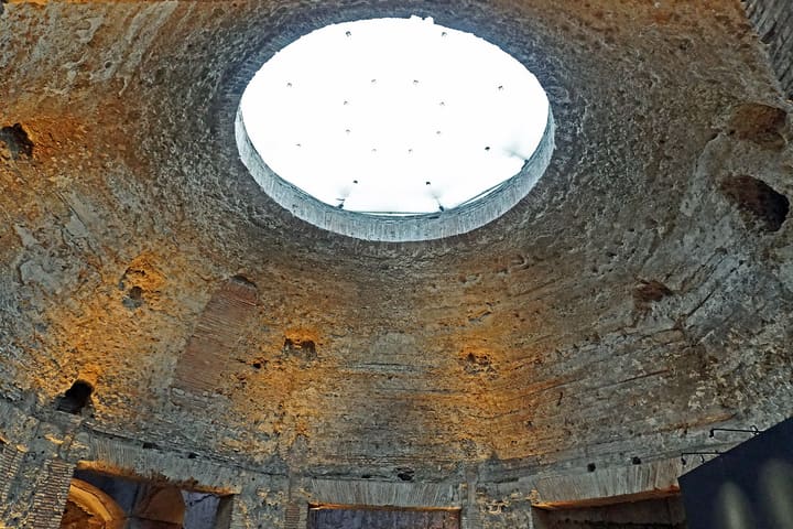 The dome and circular roof opening of the octagonal room at Domus Aurea