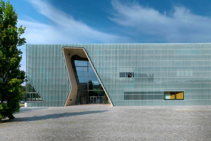 The glass facade and entrance of the POLIN Museum of the History of Polish Jews in Warsaw