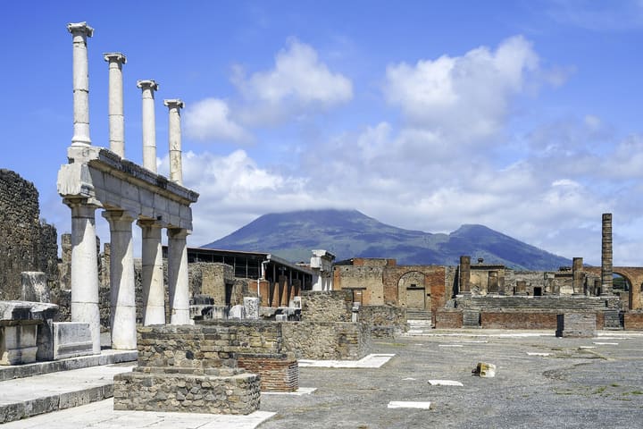 The Forum at Pompeii with Mount Vesuvius beyond the ruins
