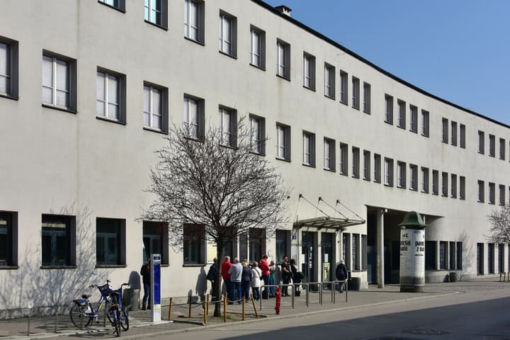 Oskar Schindler's former enamel factory on ul. Lipowa in Kraków, with visitors queueing at the entrance
